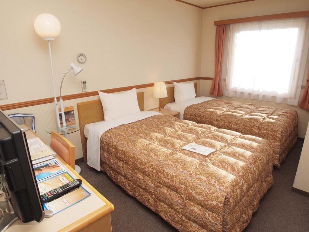 Toyoko Inn Hokkaido Asahikawa Eki Higashi Guchi Exterior photo